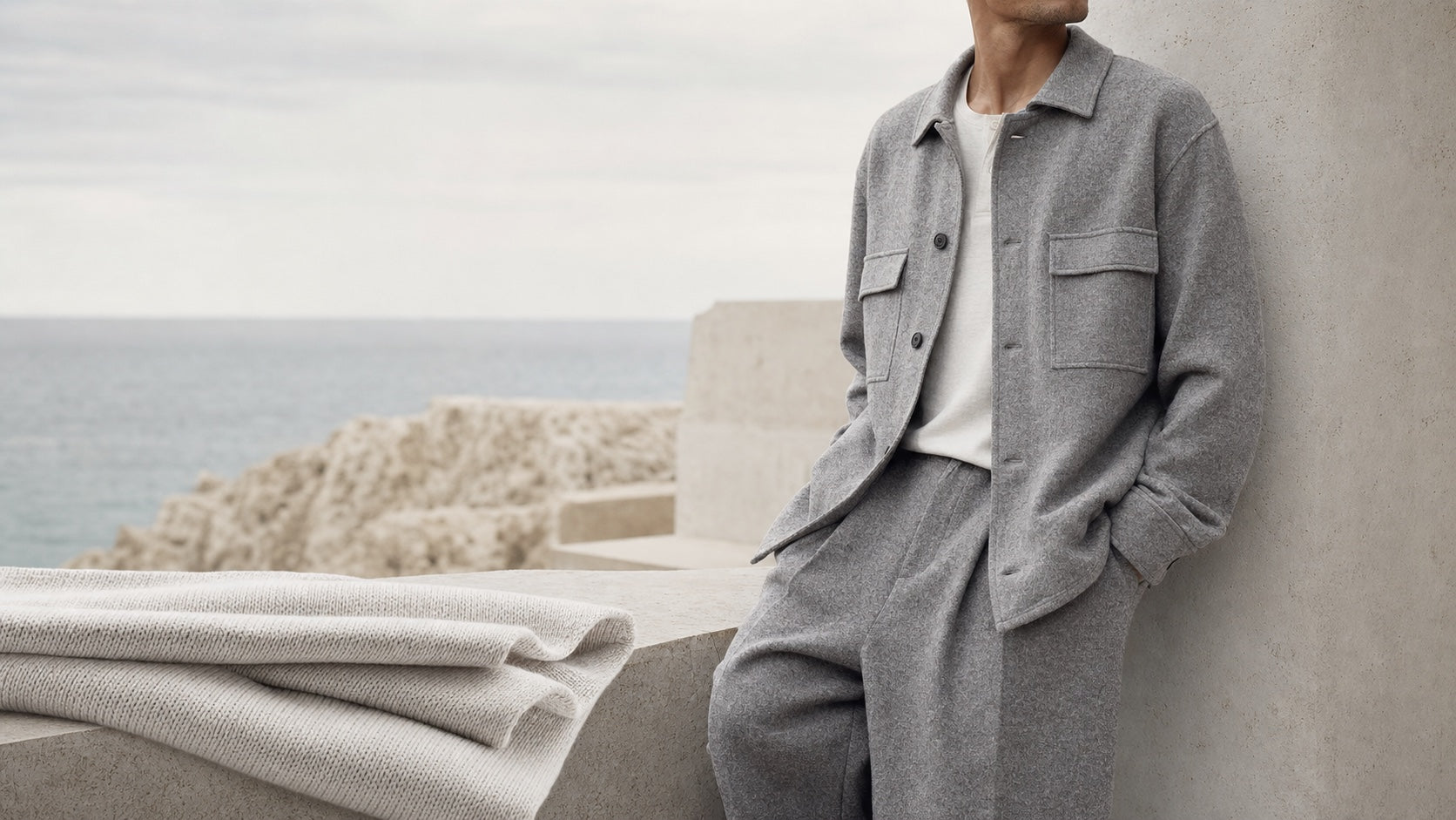 Grey tailored clothing made with flowing fabric